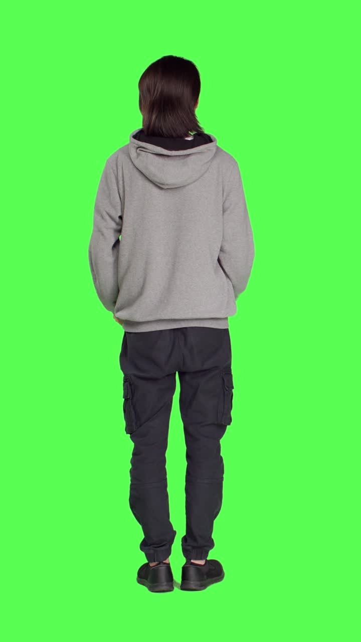 Back view of asian man acting as choir director