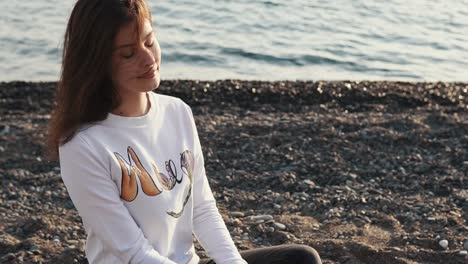 Woman on the Beach at Sunset