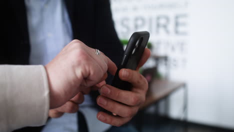 hands holding smartphone