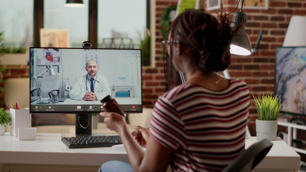 Woman having online medical consultation with doctor