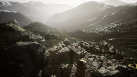 mountains in fog at sunset