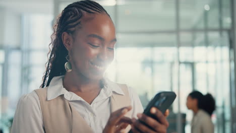 businesswoman using smartphone in office