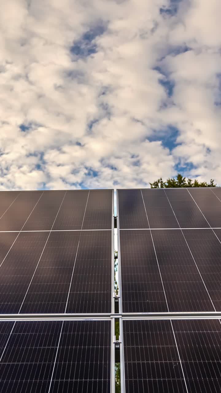 Cloudscape reflects on solar panels, time lapse view
