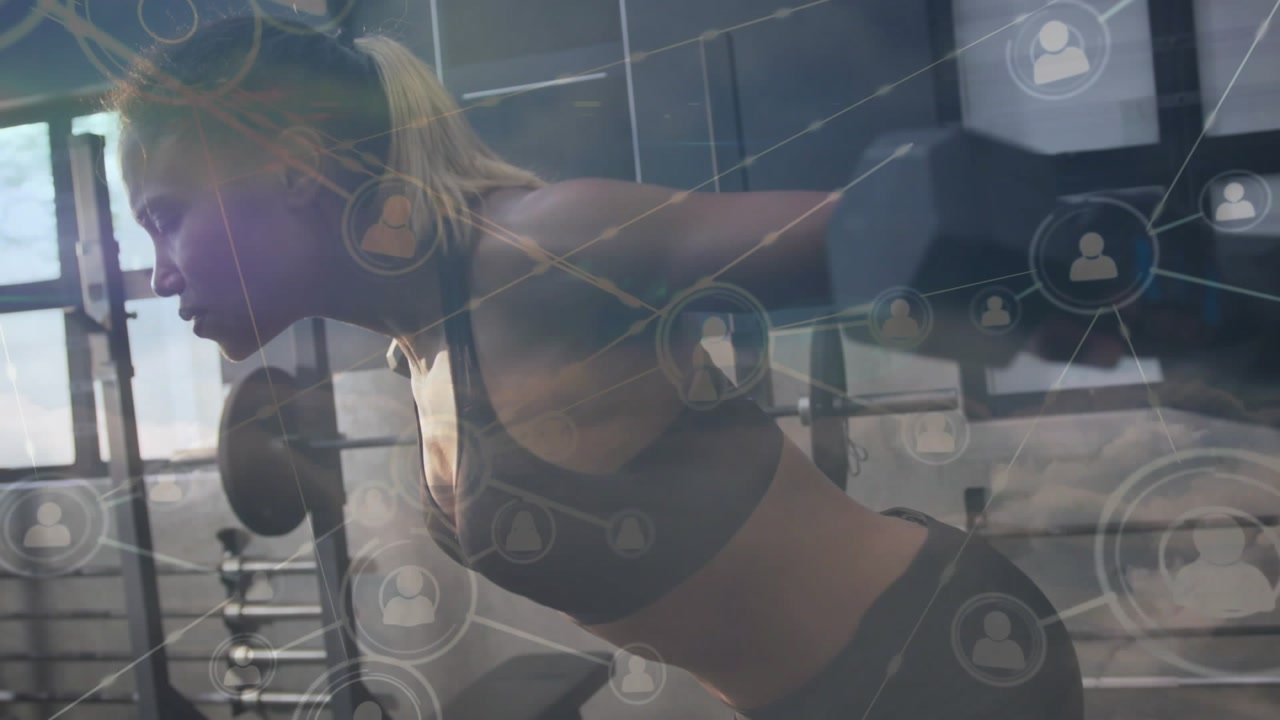 Female athlete performing bent rows at gym pulling dumbbell HUD overlay mapping metrics for fitness