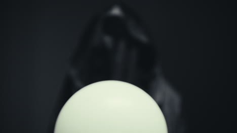 mysterious fortune teller with crystal ball