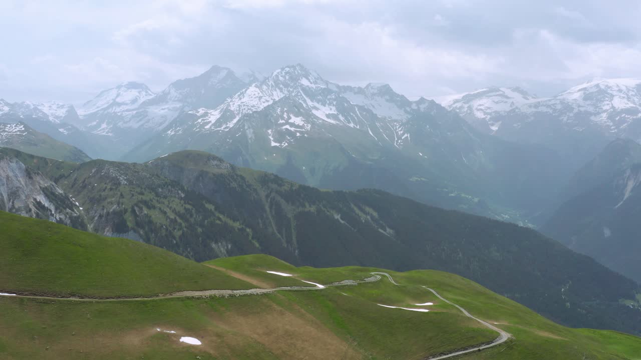 Beautiful snow covered mountains of the Alps in Europe -Aerial