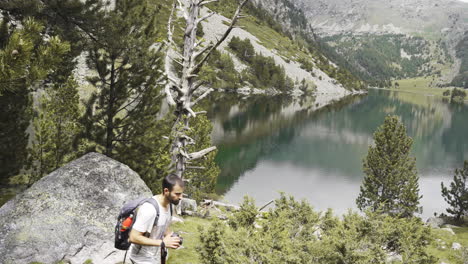 professional freelancer travel photographer taking photo of aiguestortes national park