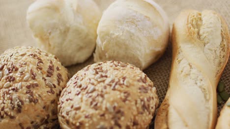 video of bread on wooden chopping board seeing from above