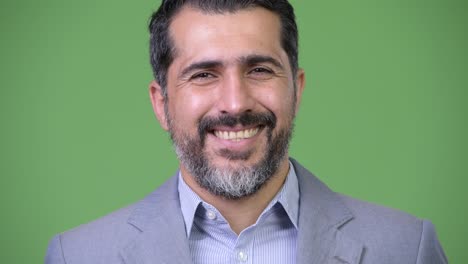 handsome persian bearded businessman smiling