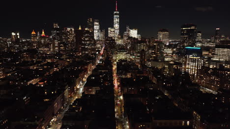 aerial view of the manhattan financial district and the world trade center. shot at night in new york city.