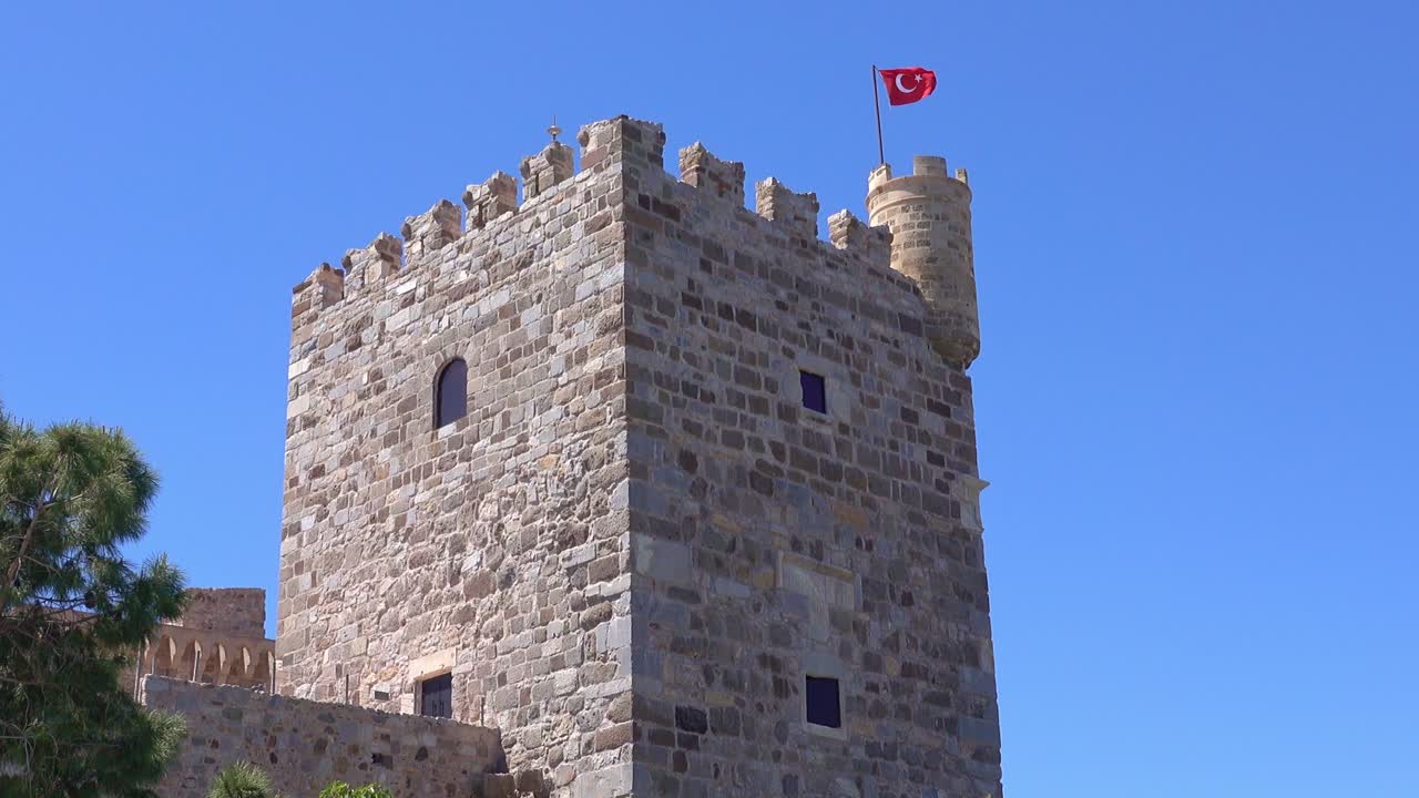 Ancient Stone Castle Tower with Turkish Flag