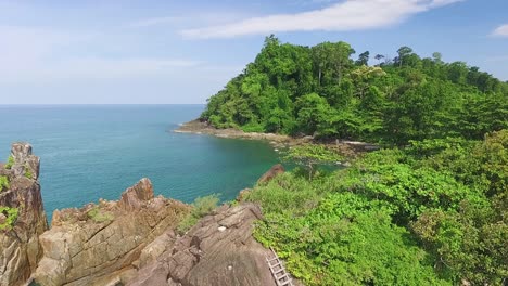 lush green rocky koh chang fantasy paradise island coastline thailand turquoise ocean bay rising aerial view