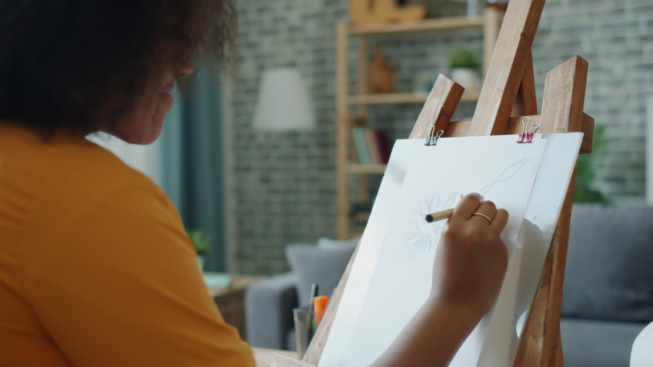 Woman drawing a sunflower