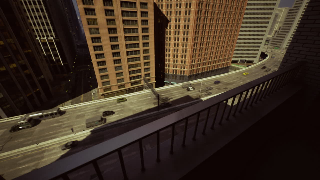 View of busy city street from a high rise balcony in urban downtown