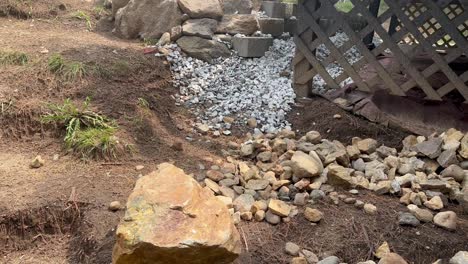 front yard diy project - retaining wall, crushed stoner, staircase, and raised garden bed in progress