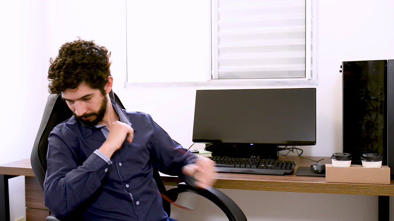 Handsome latin man facing anxiety and worried at office