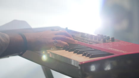 person playing a keyboard