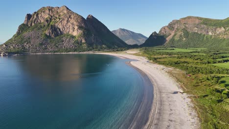 aerial footage of an incredible white sand beach on engeløya island, northern norway. during summer, it looks like a tropical paradise in the far north, bøsanden