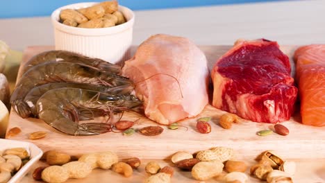 variety of protein-rich foods on wooden board