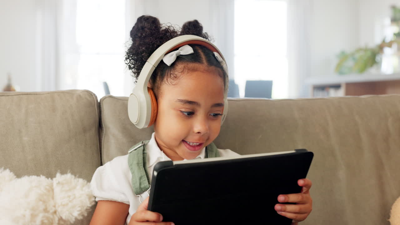 Tablet, headphones and child with e learning app