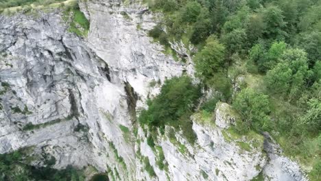 Drone-shot-of-the-side-of-a-mountain-in-France