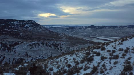 an aerial adventure: exploring kamloops' snowy hills and colorful sunrise skies