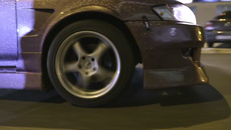 purple sports car night driving