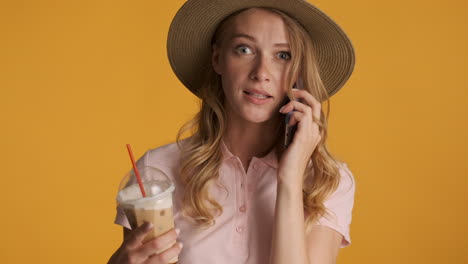 caucasian woman having phone call during summer holidays.