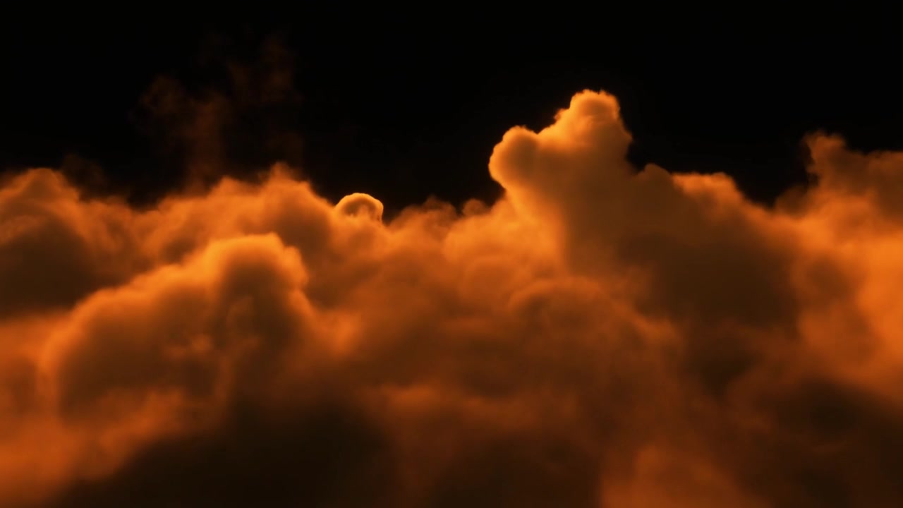 Golden Orange Clouds Moving Against a Dark Background