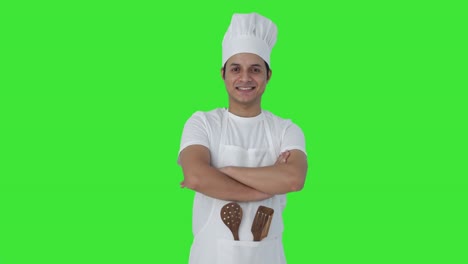 retrato de un feliz chef profesional indio pantalla verde