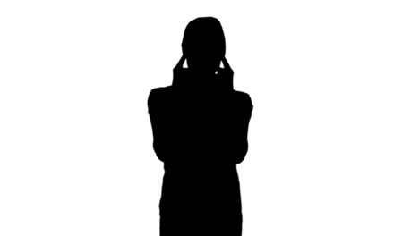 woman getting headache in black silhouette