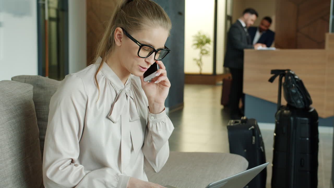 Businesswoman in Hotel Lobby