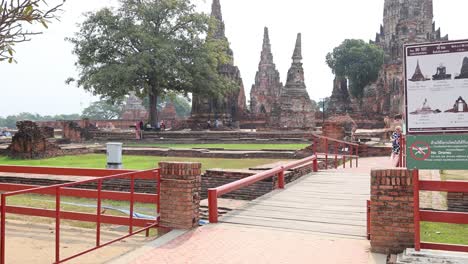 visitors in traditional attire at historic site