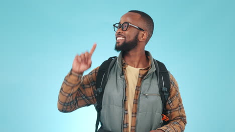 Hiking,-pointing-and-black-man-on-blue-background