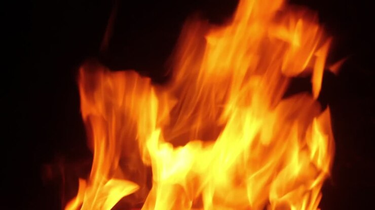 A large wood fire with flames