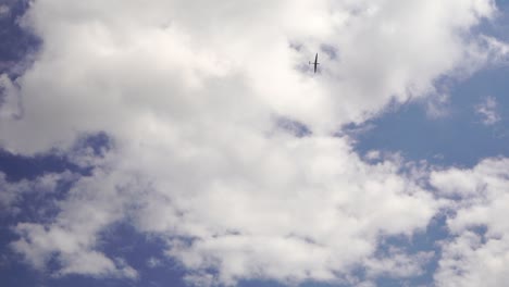 small plane in a blue sky