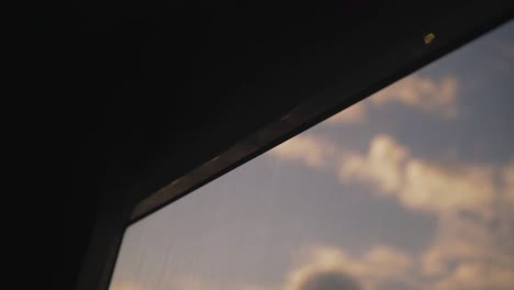 sunrays shining on the window of a boat