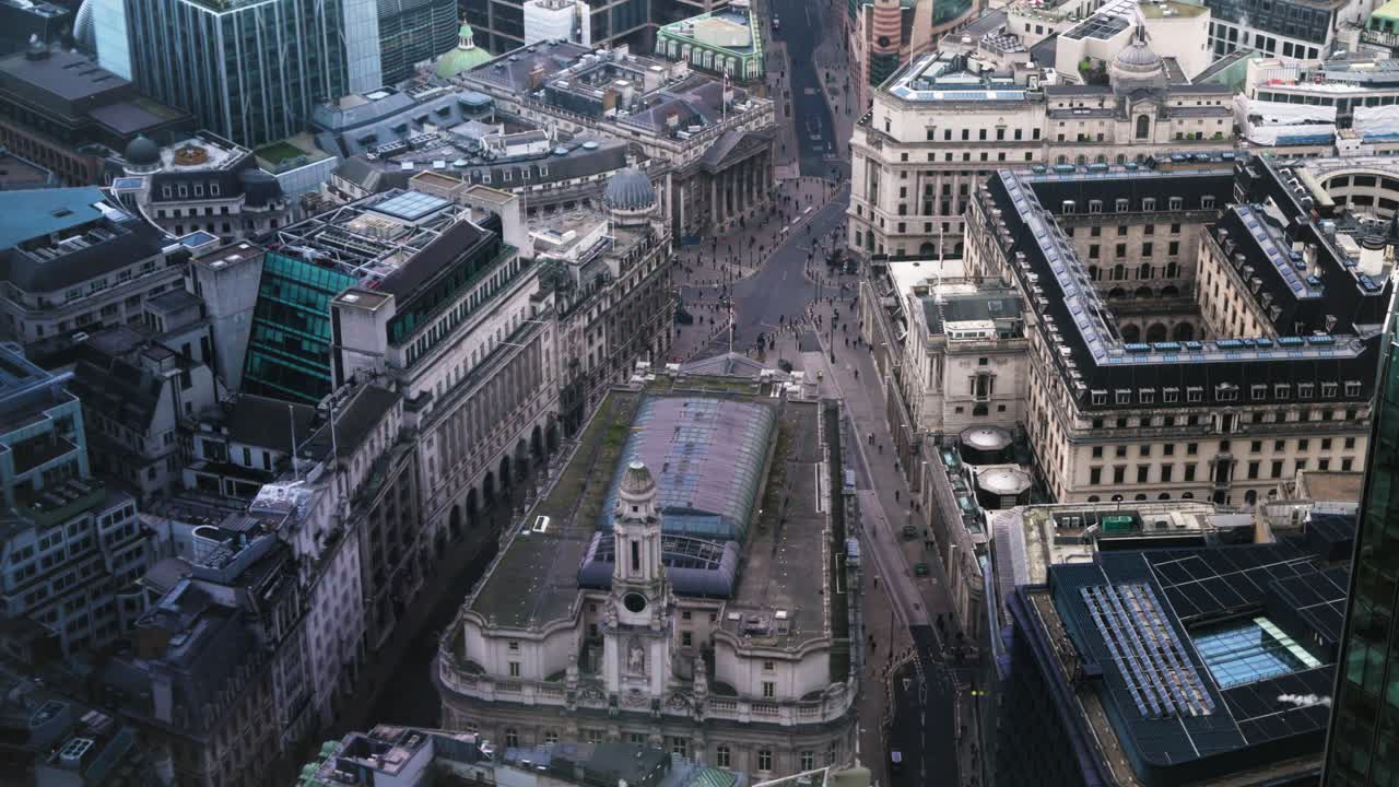 Timelapse Aerial view from behind the Bank of England, showing commuters travelling to work in London, capital of the UK.