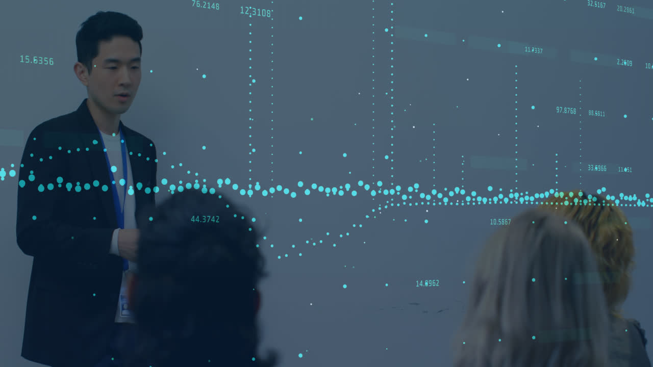 Animation of financial data over asian businessman making presentation