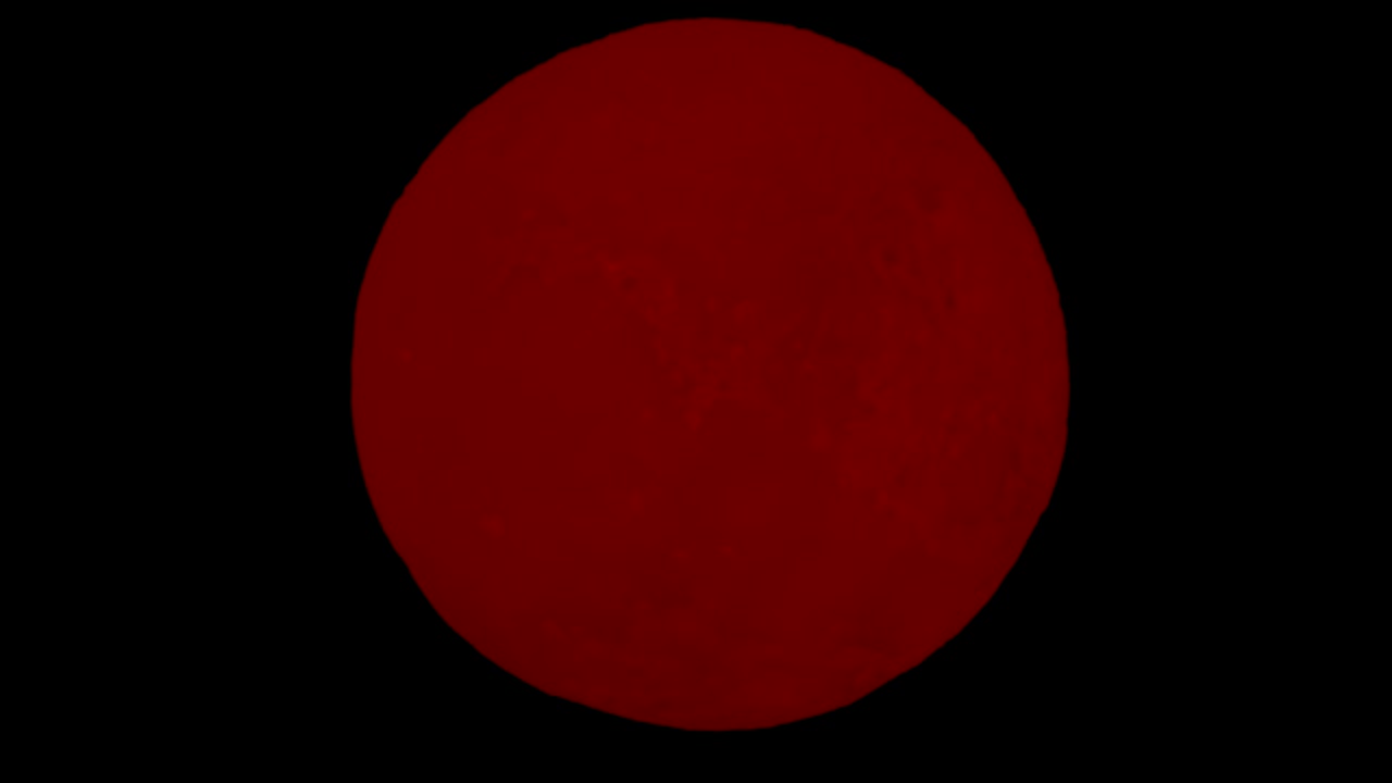 赤い惑星状の球が回っている