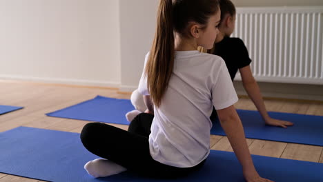 kids practising yoga