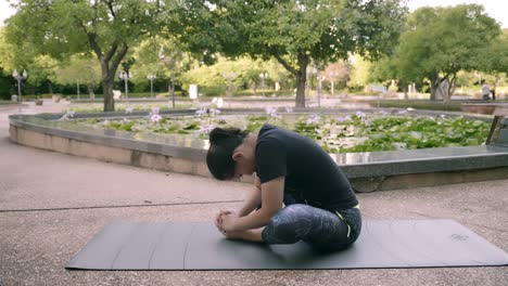 asian woman exercise in park outdoor with new normal in covid-19 situation