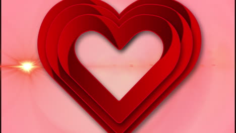 animación de un corazón rojo pulsando sobre una luz brillante sobre un fondo rosa.