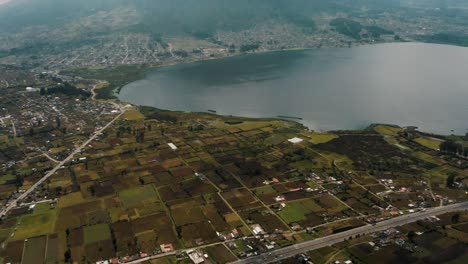 Laguna-De-San-Pablo-And-Its-Surroundings-In-Otavalo,-Ecuador---Aerial-Panoramic