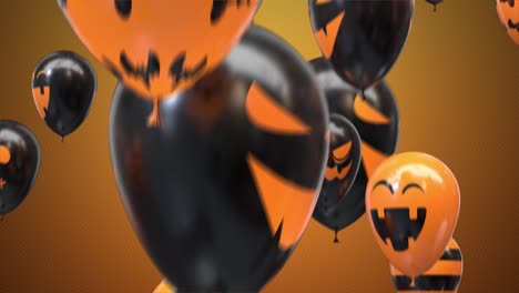 el bucle volando globos de halloween en el fondo naranja