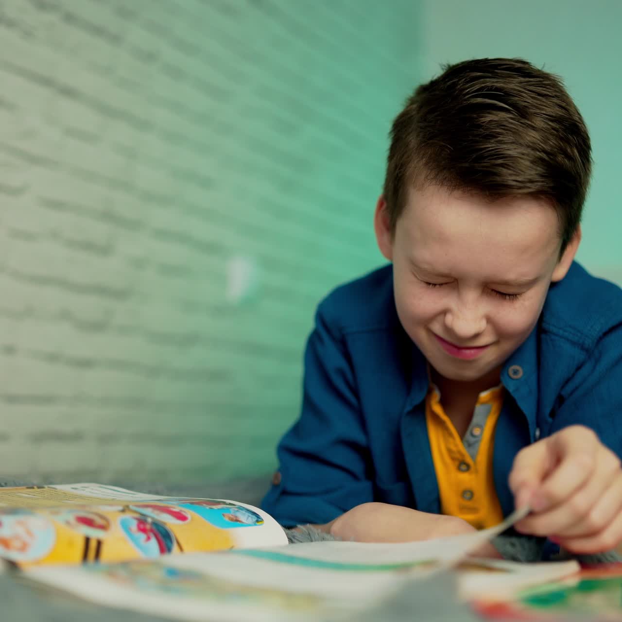 Self isolation concept. Young boy studying from home during Covid-19. All stay at home. Remote studying from home during Quarantine.