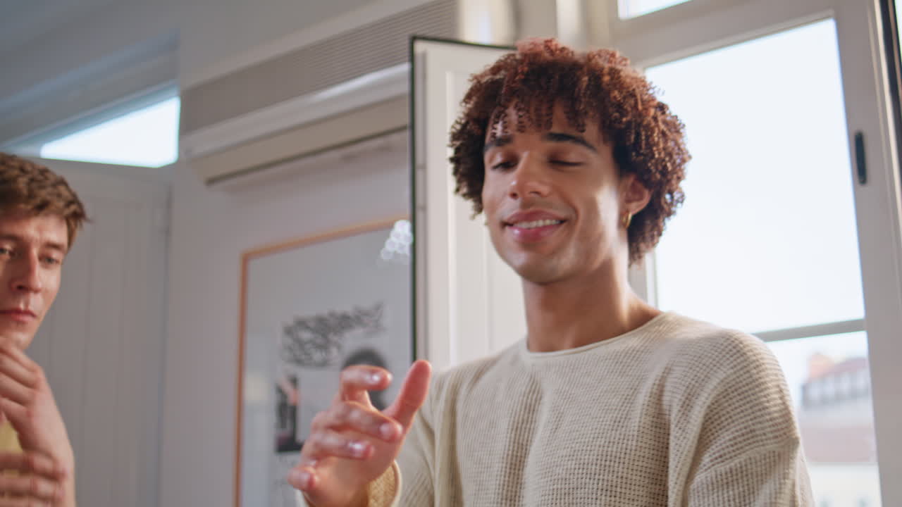 Closeup energy student dancing at room with friends. guy dance movements