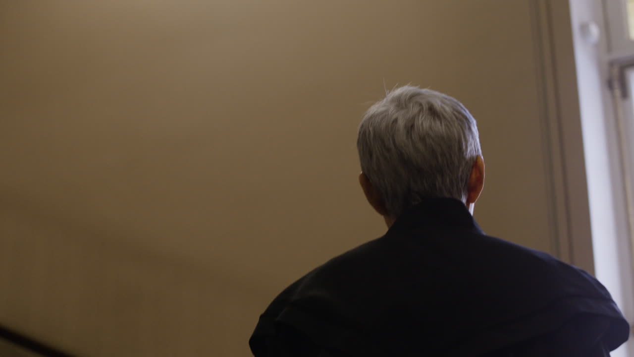 People in a building hallway