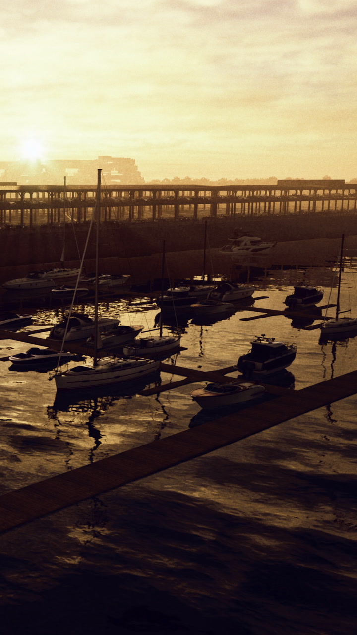 Evening at the marina with boats and a bridge in the background