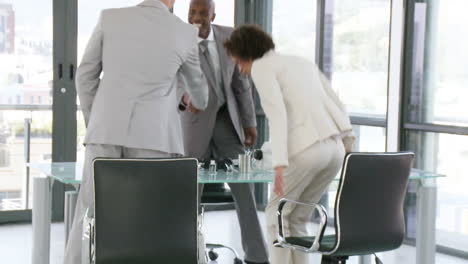 Three-nice-businesspeople-in-a-businessmeeting